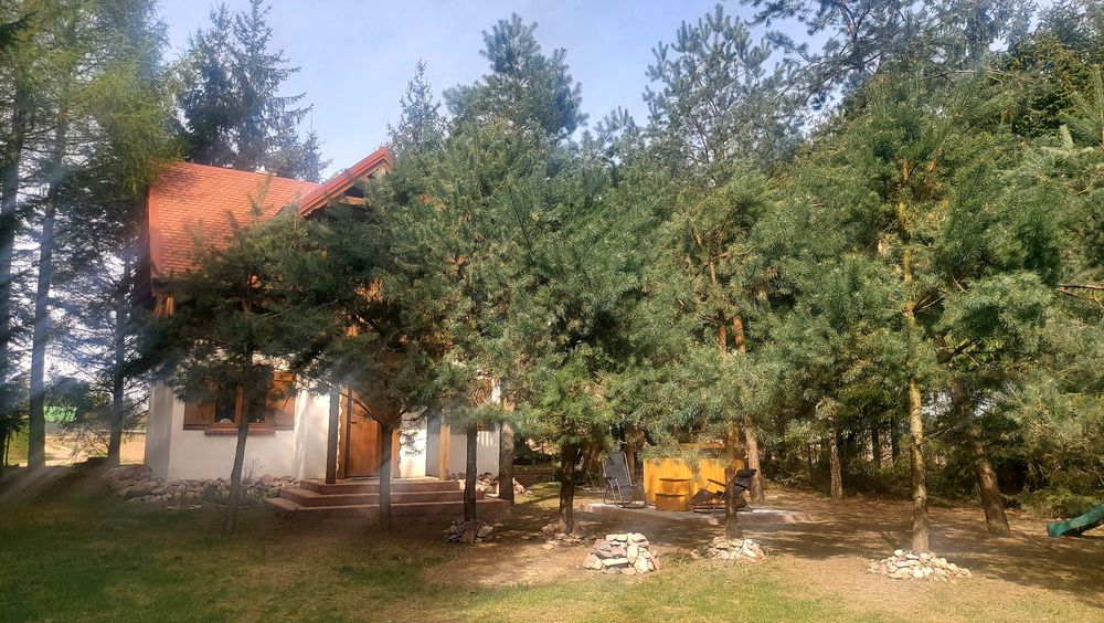 Dom nad jeziorem kiełpińskim LAS balia łódka