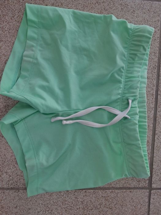 Kąpielówki jasno zielone roz.110/116 H& M