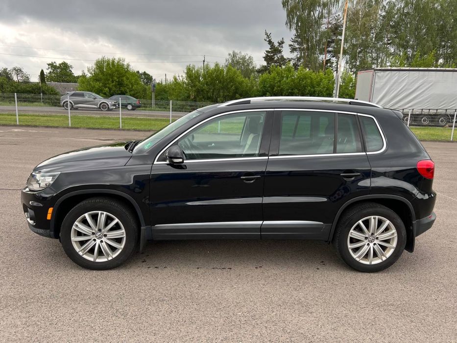 Volkswagen Tiguan 2015 VIN WVGBV7AX5GW539571 фото оголошення 3 з 13
