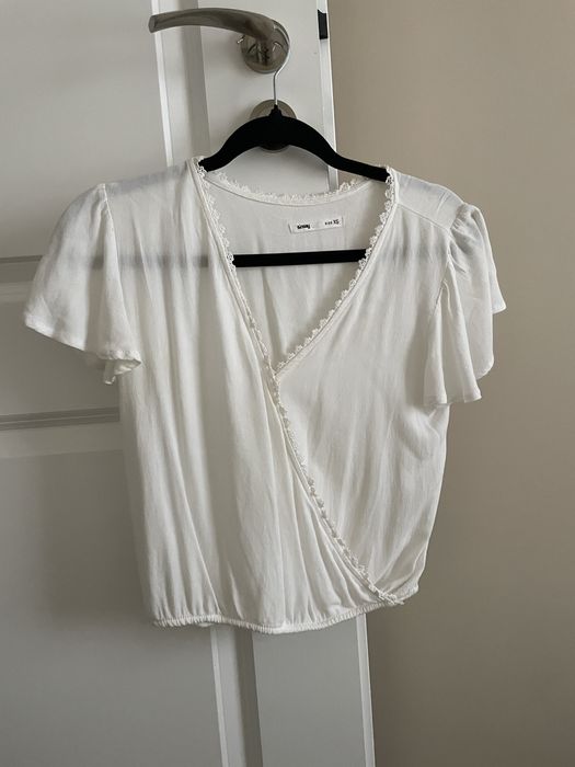 Biała elegancka bluzka Sinsay