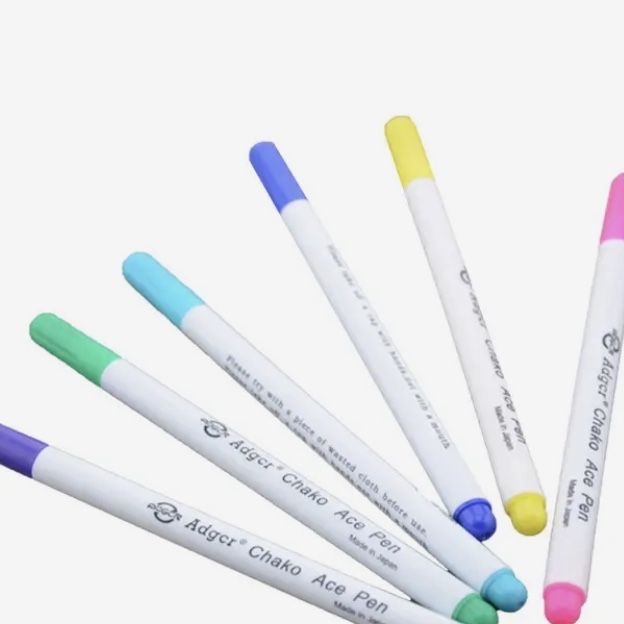 Фломастери для розмітки по тканині ,змивається холодною водою .