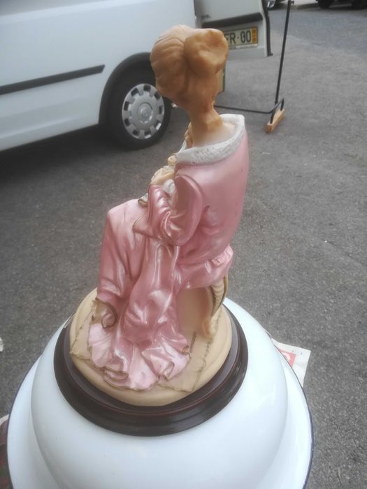 estatueta de marfinite mãe rica