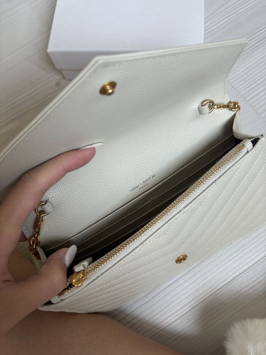 Ysl cassandre kremowa kopertowka torebka z lancuszkiem zlota