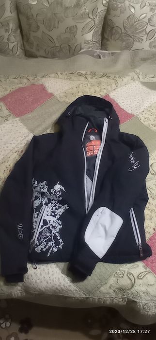 Куртка  тепла нова розмір 40