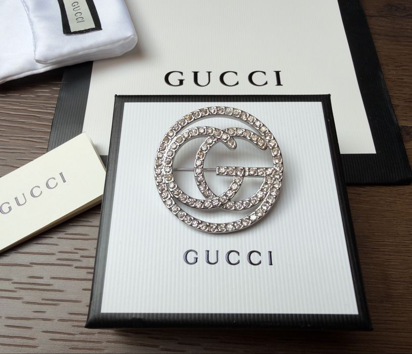 Broszka Gucci srebrna z cyrkoniami