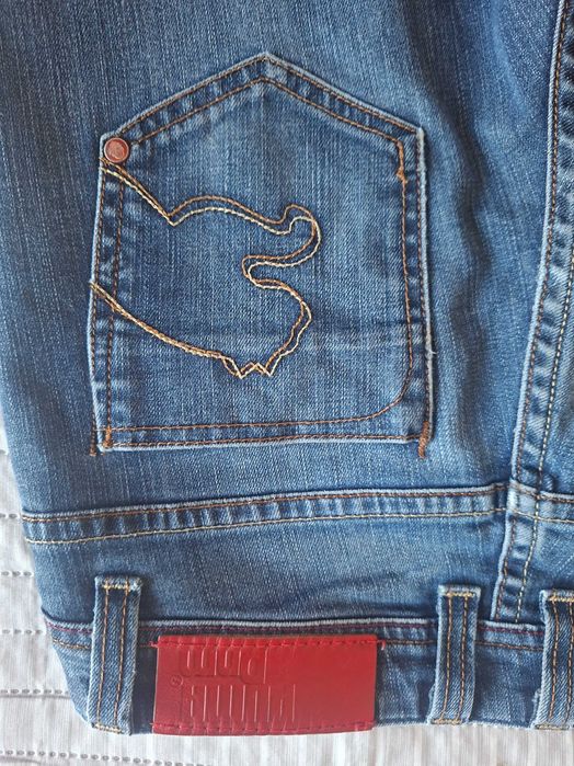 Dżinsy jeansy Puma ciemnoniebieskie 26/32