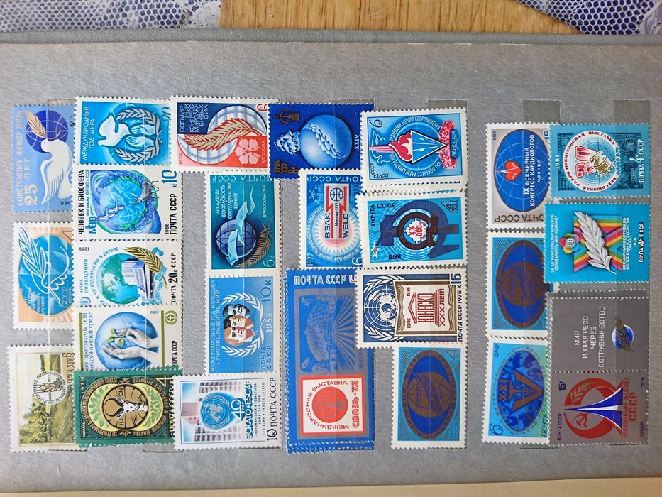 Альбом марок на тему олимпийские игры, космос, города, выставки.