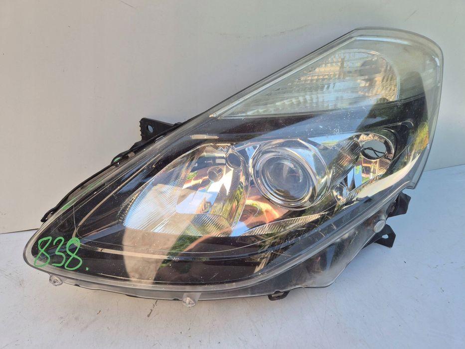 renault clio iii lift lampa przód przednia lewa 8200775869 zabrudzona