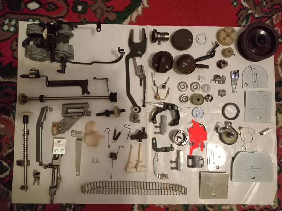 Запчасти швейных машин и оверлоков.