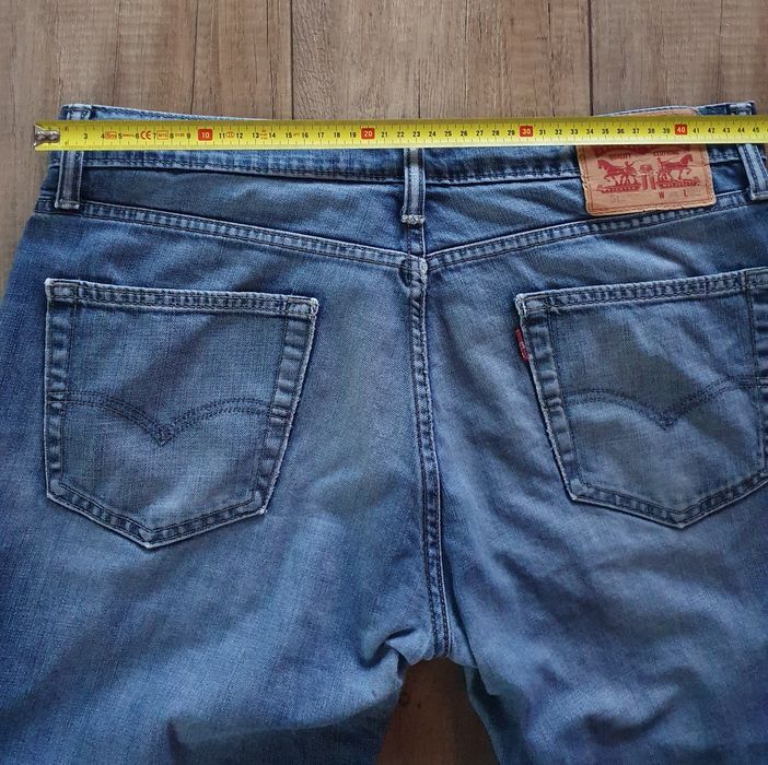 Levis 511 Przylegające SPODNIE JEANS przecierany niebieski - W34/L32