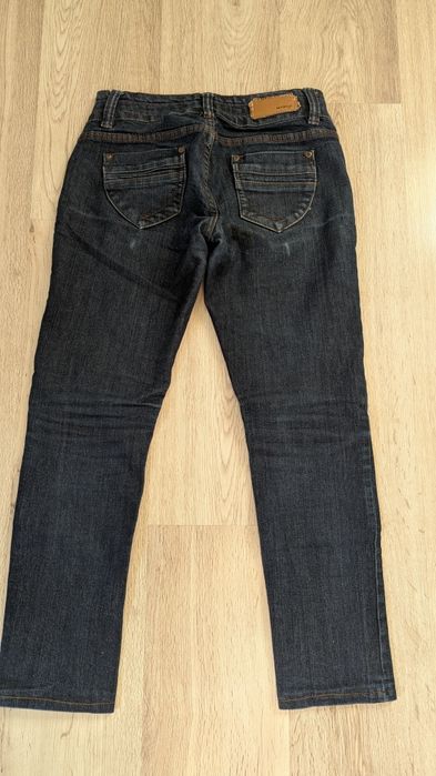 Damskie spodnie jeansowe Orsay 36