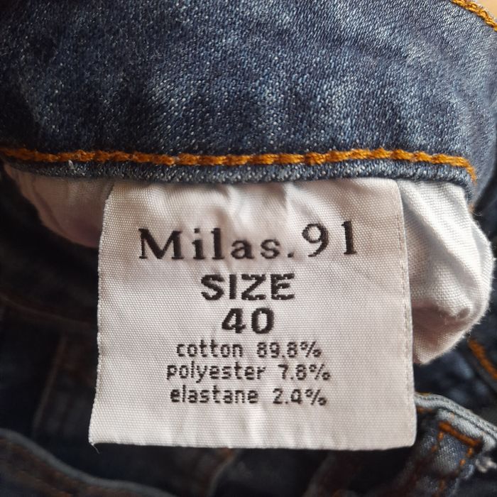 Spodnie dzins z dziurami r.40