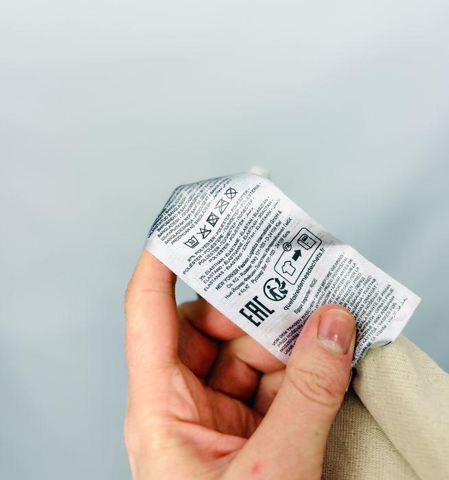 Kremowa bluzka z wysoką stójką S 36