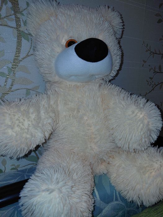 Ведмедик, м'яка іграшка, розмір в положені сидя  20см*35см.