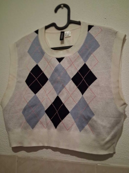 Saia Breskha,top H&M e short Rafthi.