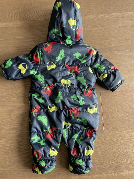 Nowy kombinezon 3-6 m