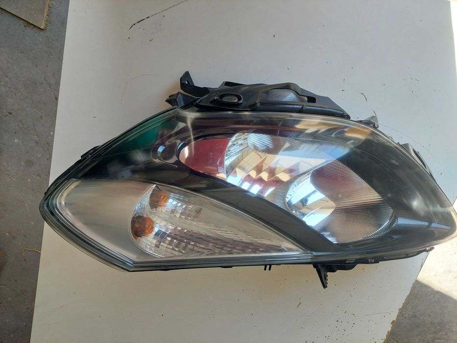 farol esq Renault clio 3