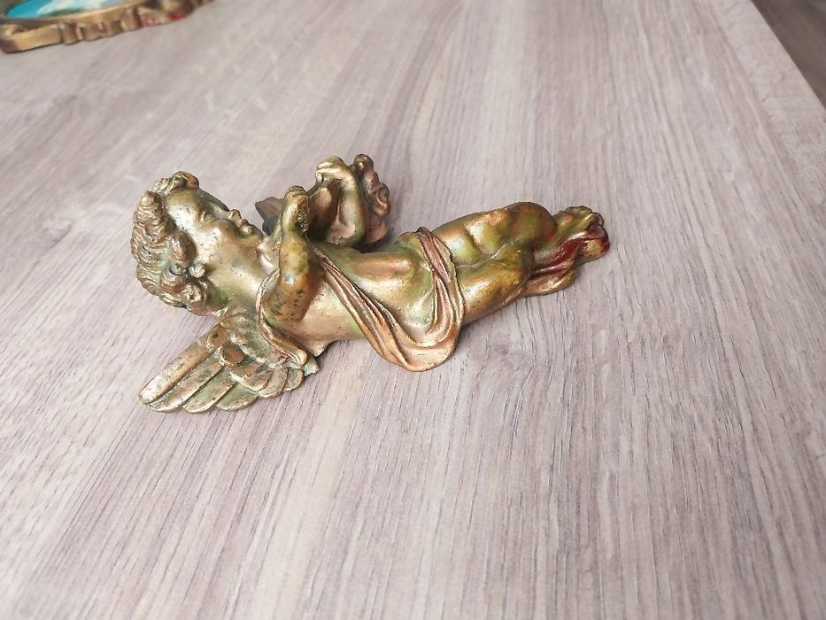 Anjo decorativo dourado
