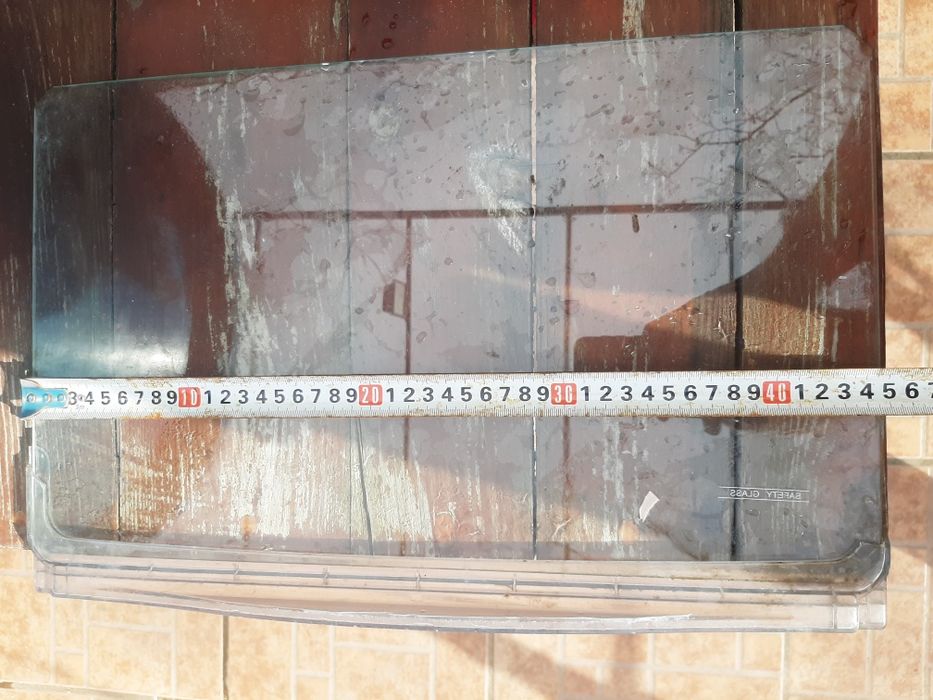 Стеклянная полка в холодильник 45×29