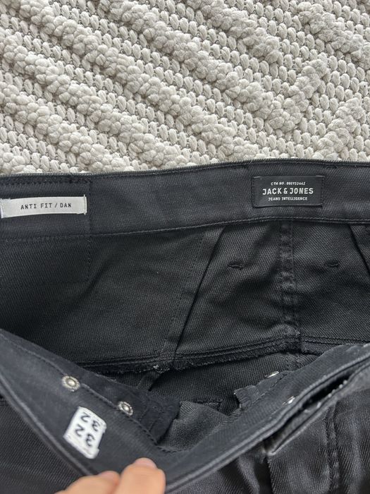 Jeansy męskie powlekane Jack & Jones woskowane czarne anti fit dan