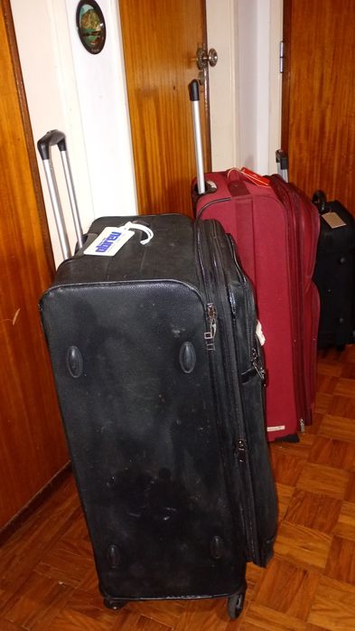 Conjunto de três malas de viagem