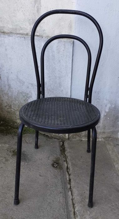 Thonet-style Bentwood chair with tubular metal frame and black rattan seat