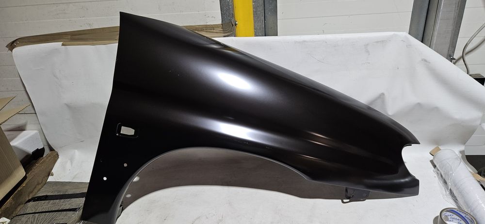 Błotnik prawy przód citroen berlingo 96- nowy oryginał