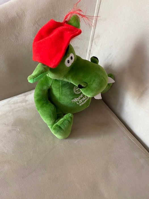 Smok Wawelski pluszowa zielona  maskotka w czapce krakowskiej 20cm