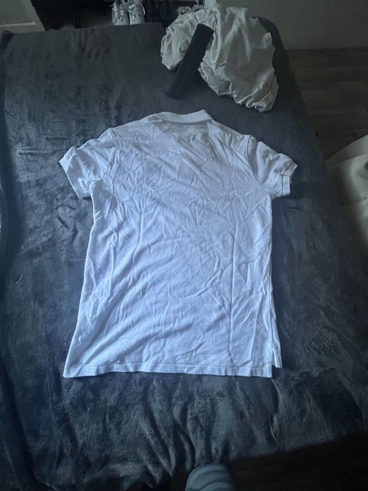 Polo camiseta.