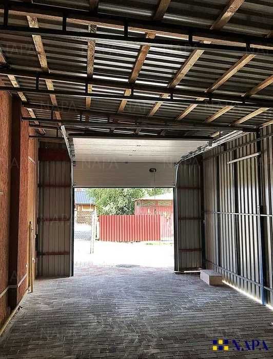 Підйомні гаражні секційні ворота GANT від представника заводу