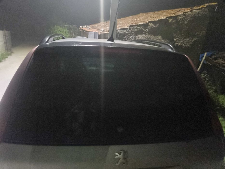 Vidro da mala do Peugeot 205 sw
