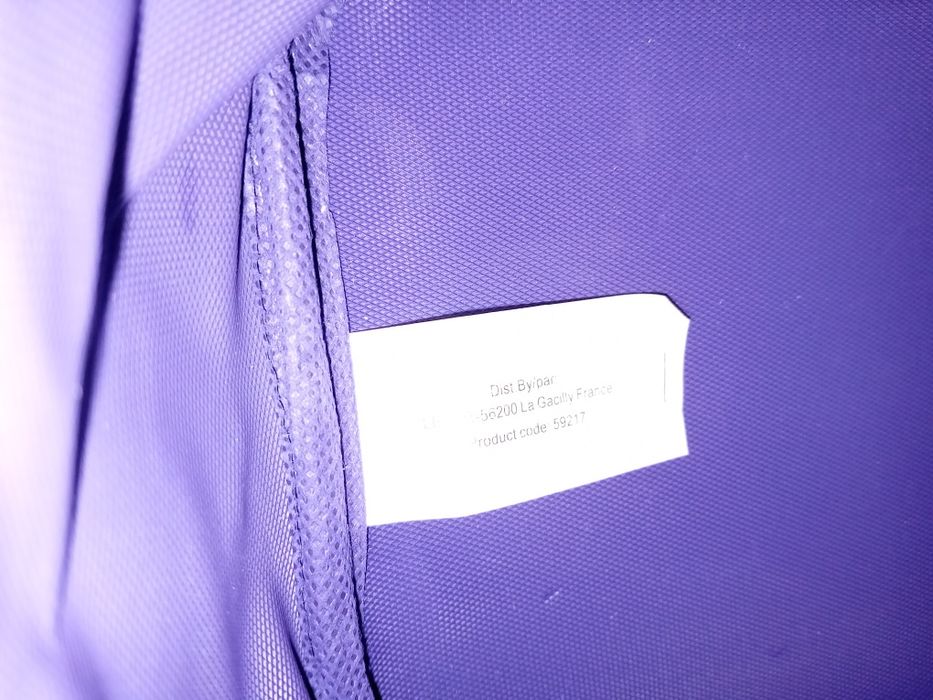 Nowa kosmetyczka fioletowa z rączką.