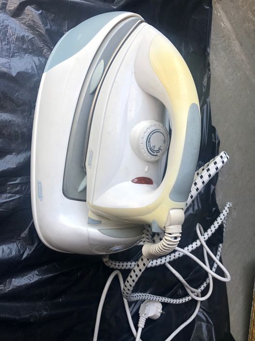 Продам б/у утюг с парогенератором