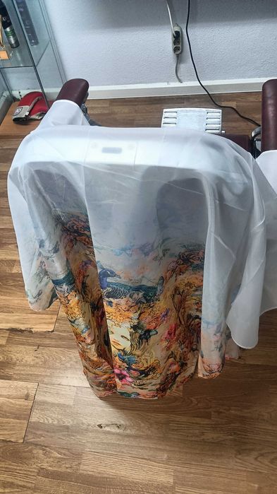 Capa protetora para corte cabelo