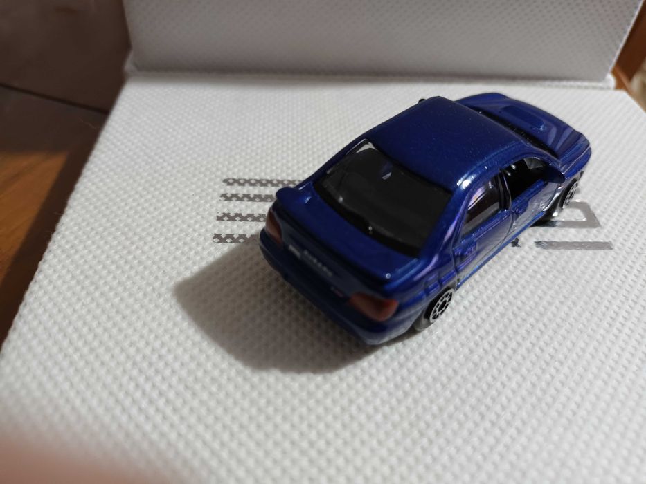 Miniaturas 1/64 Welly CM