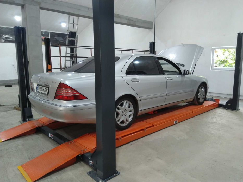 четырехстоичный подъемник для ремонта и для развала-схождения