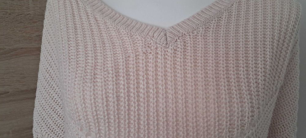 Sweter różowy...