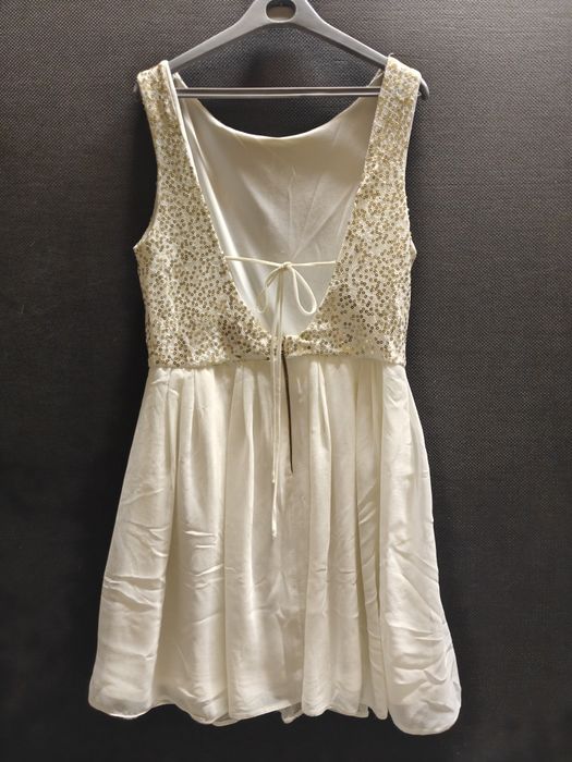 Sukienka ecru z cekinami