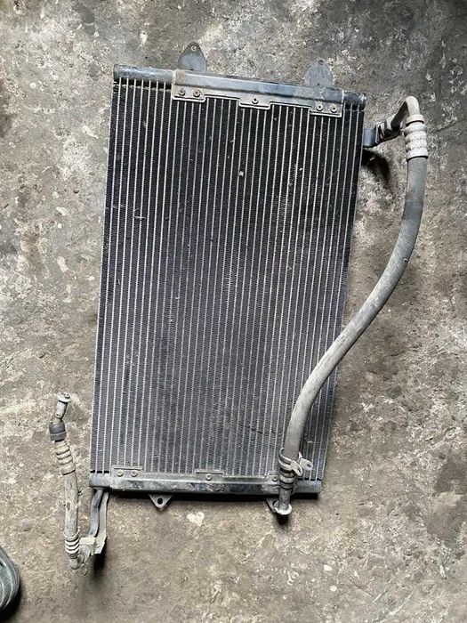 радіатор кондиціонера гольф 3 орегінал с патрубками