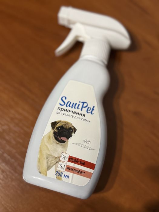 спрей SaniPet для привчання собак до туалету.