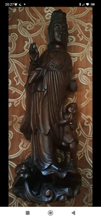 Deusa da fertilidade com o menino