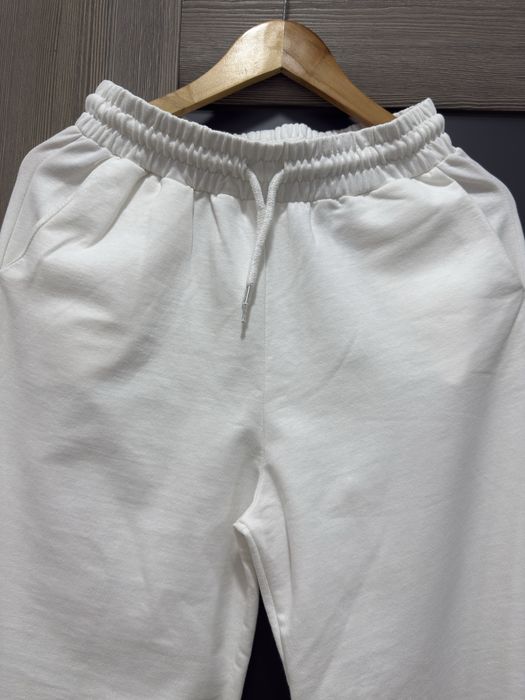 Білі штани палаццо