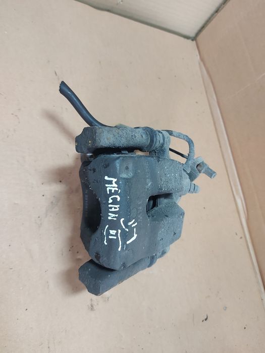 / Megane III 3 zacisk hamulcowy lewy tył