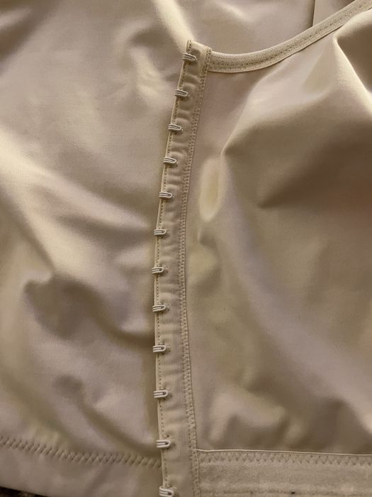 Colete de compressão L