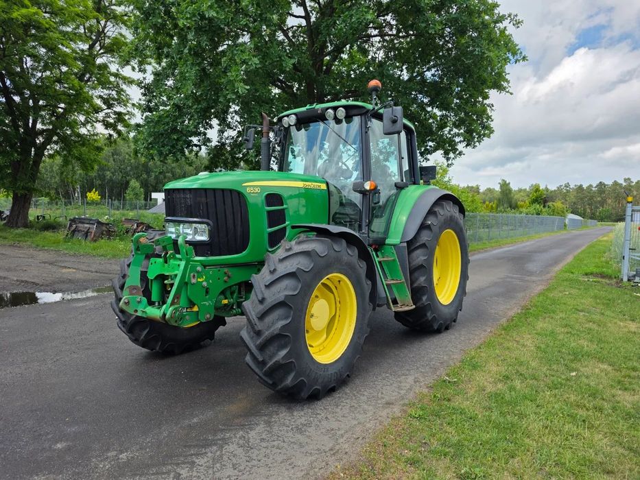 John Deere 6530 Premium  PowerQuad PLUS  TUZ amortyzowana oś 40km/h ECO oryginał nie malowany