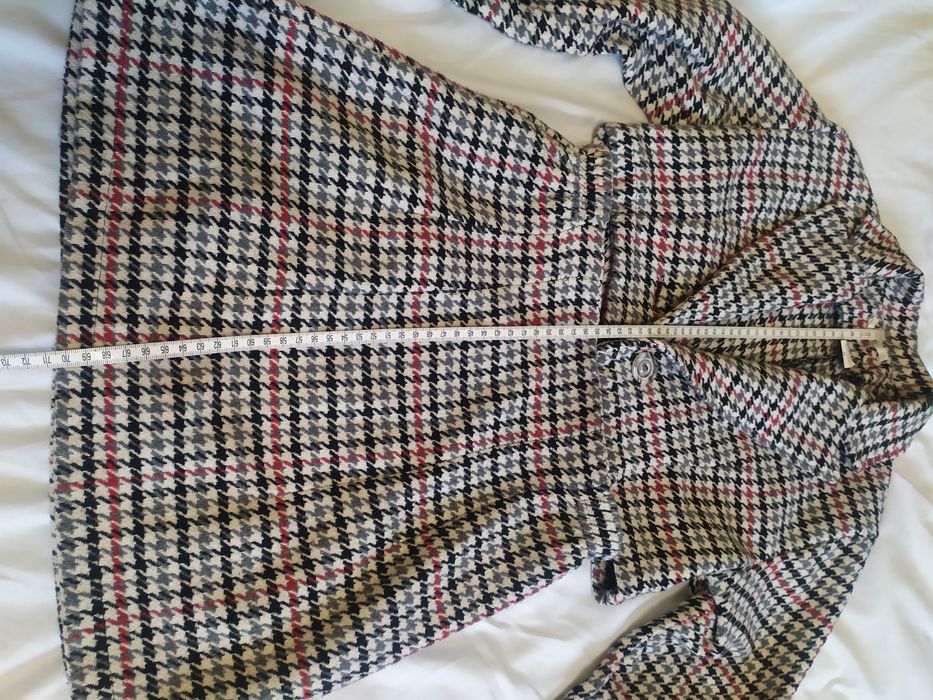 Костюмчик зі спідницею. Дуже гарний.Піджачок укорочений.  Стан нового.