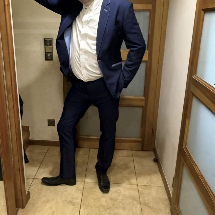 Garnitur ciemno niebieski rozmiar 54 na komunie