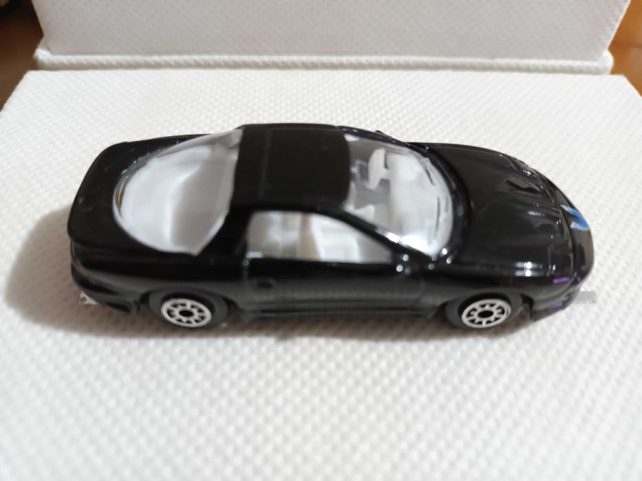 Mimiaturas 1/64 Welly CM2