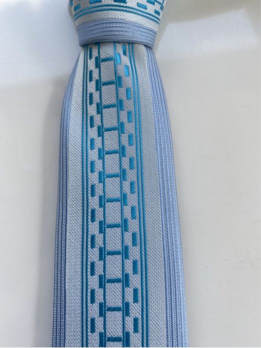 Krawat męski nowy 5,5 cm szerokość kolor niebieski nie używany