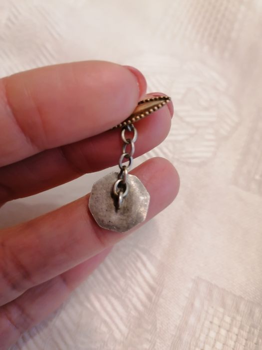 Botões de punho antigos